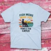 Fish more work less that's the catch light blue Anglers T-shirts Fish more work less that’s the catch light blue Anglers T-shirts