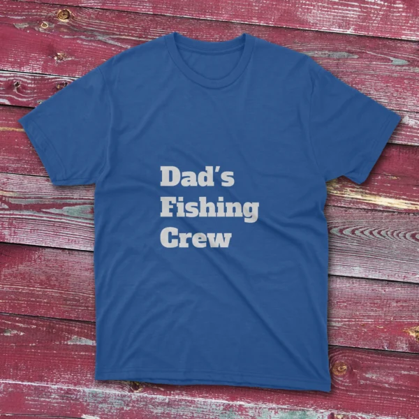 A royal blue fishing t-shirt that has "Dad's Fishing Crew" words with a bold slab serif font