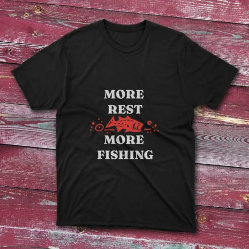 Black T-shirt with the phrase "More Rest, More Fishing" in bold white text, shown against a light blue background.