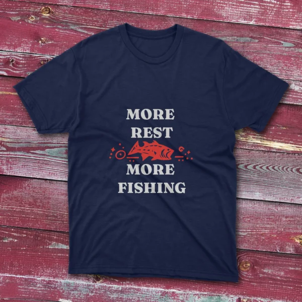 Navy T-shirt with the phrase "More Rest, More Fishing" in bold white text, shown against a light blue background.