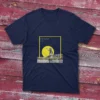 A modern look design of a Navy fishing T-shirt, the design has the quote The fishing was good, it was the catching that was bad and an image of a man fishing on a lake. with yellow shapes in the design