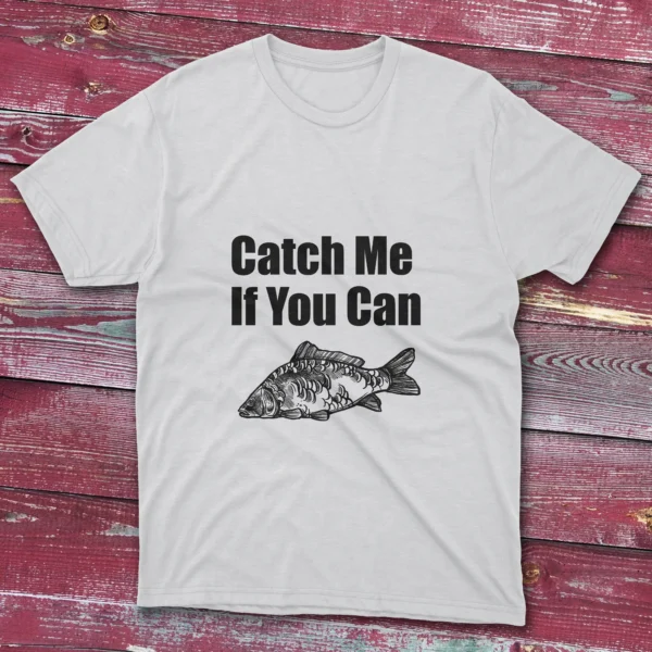 white fishing T-shirt featuring the phrase "Catch me if you can" in bold white text with a white fish illustration, set against a light blue background.