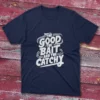 A navy blue T-shirt with the phrase "The Good, The Bait, And The Catchy" in bold text, shown on a light blue background.