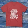 A red T-shirt with the phrase "The Good, The Bait, And The Catchy" in bold text, shown on a light blue background.