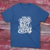 A royal blue T-shirt with the phrase "The Good, The Bait, And The Catchy" in bold text, shown on a light blue background.