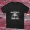 Black T-shirt: Black T-shirt with Who needs a spring break text and decorative designs