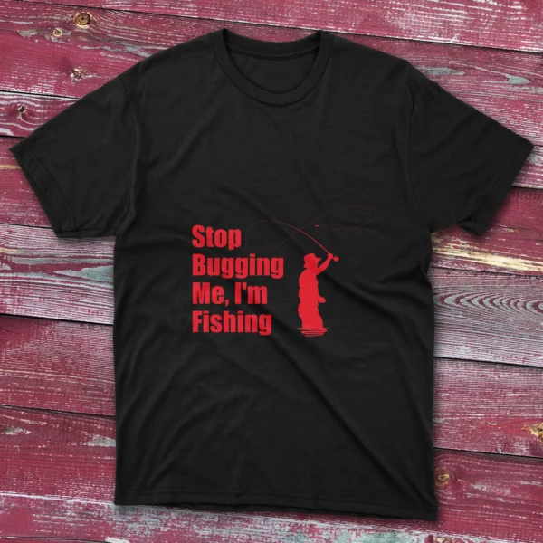 Black T-shirt with Stop bugging me, I'm fishing - 2025 text