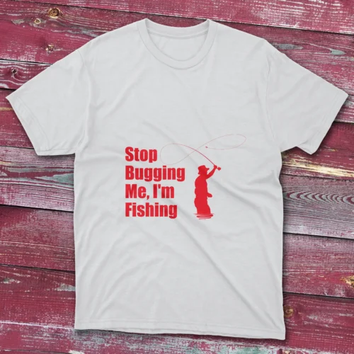 White T-shirt showcasing Stop bugging me, I'm fishing - 2025 text