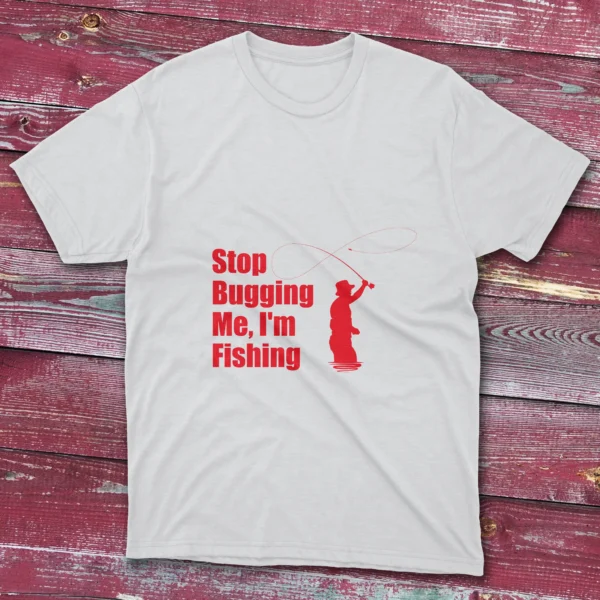 White T-shirt showcasing Stop bugging me, I'm fishing - 2025 text