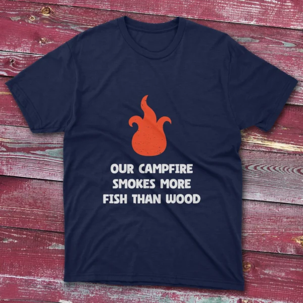 Navy blue T-shirt featuring Our campfire smokes more fish than wood - 2025 design